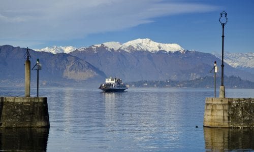 ferry-boat-alpine-lake-maggiore-with-snow-capped-mountains-piedmont-italy-pf11j9462px2egeeo6ntd8lh3cmthzgqlzjs0jffso (1)-min